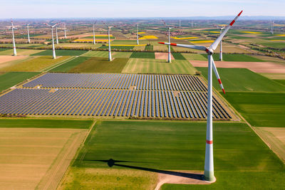 A bird's-eye view of green electricity from ground-mounted solar systems and wind turbines, germany