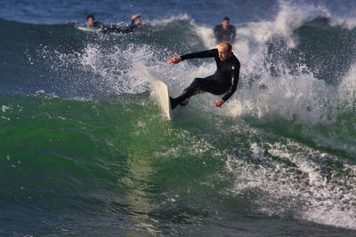 Man surfing in sea