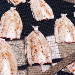 High angle view of meat on barbecue grill