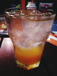 Close-up of beer glass on table