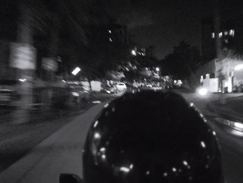 Close-up of cars on road at night