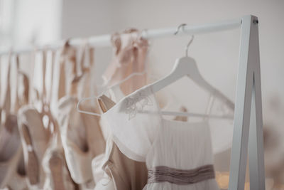 Close-up of clothes hanging on rack