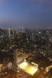 Illuminated cityscape at night