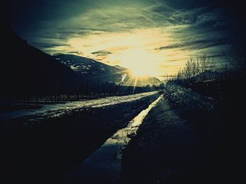 Empty road at sunset