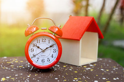 Close-up of clock on table