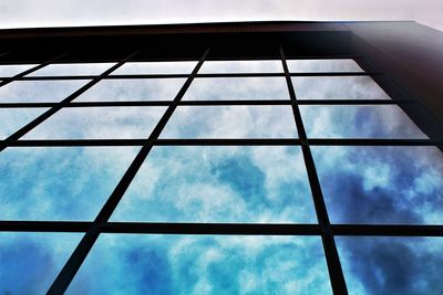 Low angle view of office building against sky