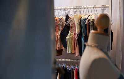 Clothes hanging in store for sale