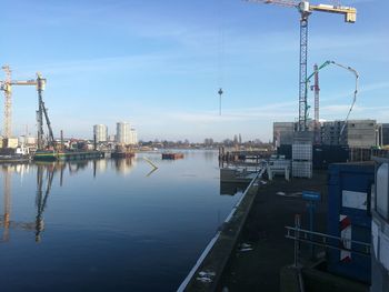 Boats moored at harbor