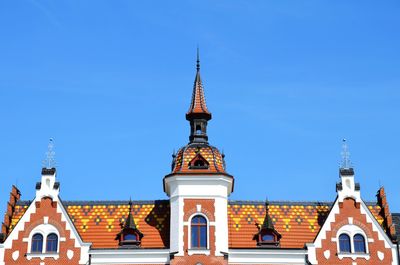 Low angle view of building against blue sky