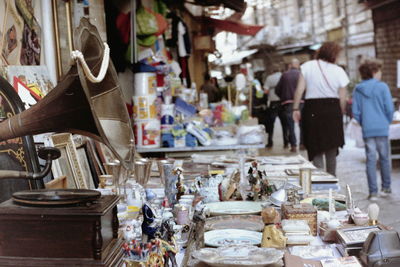 People at market stall