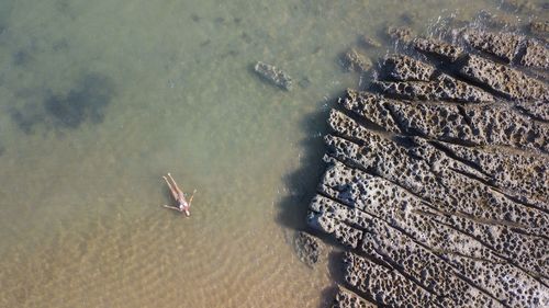 High angle view of nautical vessel on sand