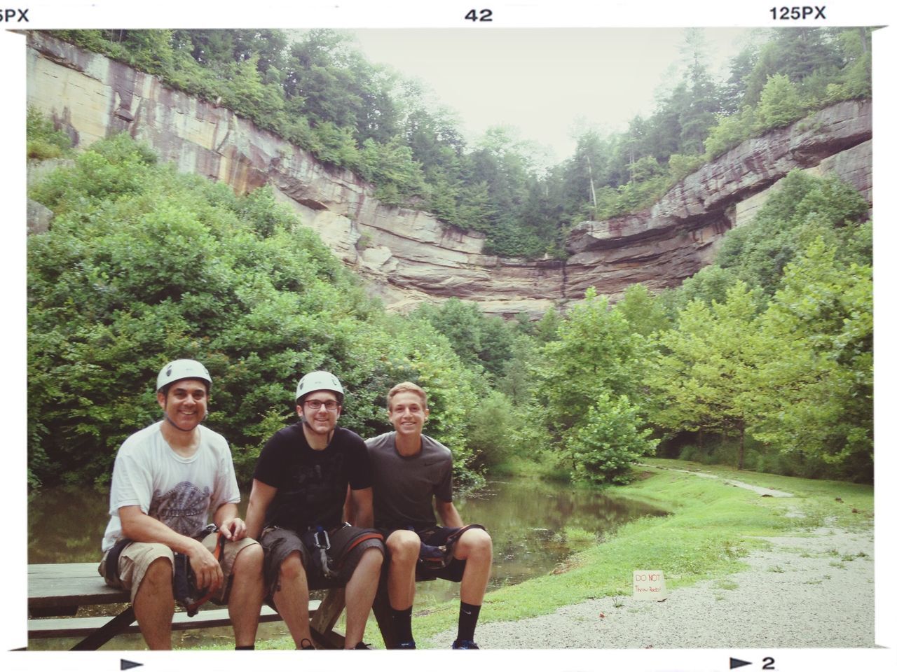 lifestyles, leisure activity, young adult, person, casual clothing, young men, smiling, looking at camera, togetherness, transfer print, tree, sitting, portrait, vacations, mountain, happiness