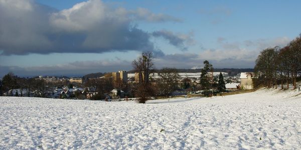 Panoramic view of landscape against sky during winter