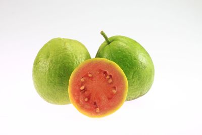 Close-up of fruits against white background