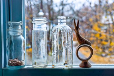 Close-up of glass jar on table