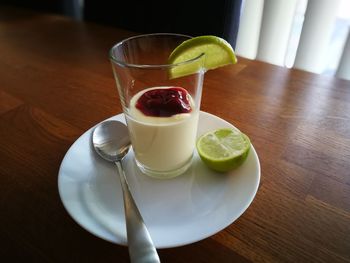 High angle view of drink in glass on table