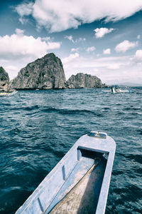 Scenic view of sea and rocks against sky