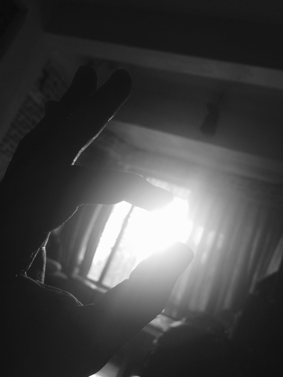 person, indoors, lifestyles, part of, unrecognizable person, men, leisure activity, human finger, sunlight, personal perspective, cropped, high angle view, night, shadow, low section, close-up