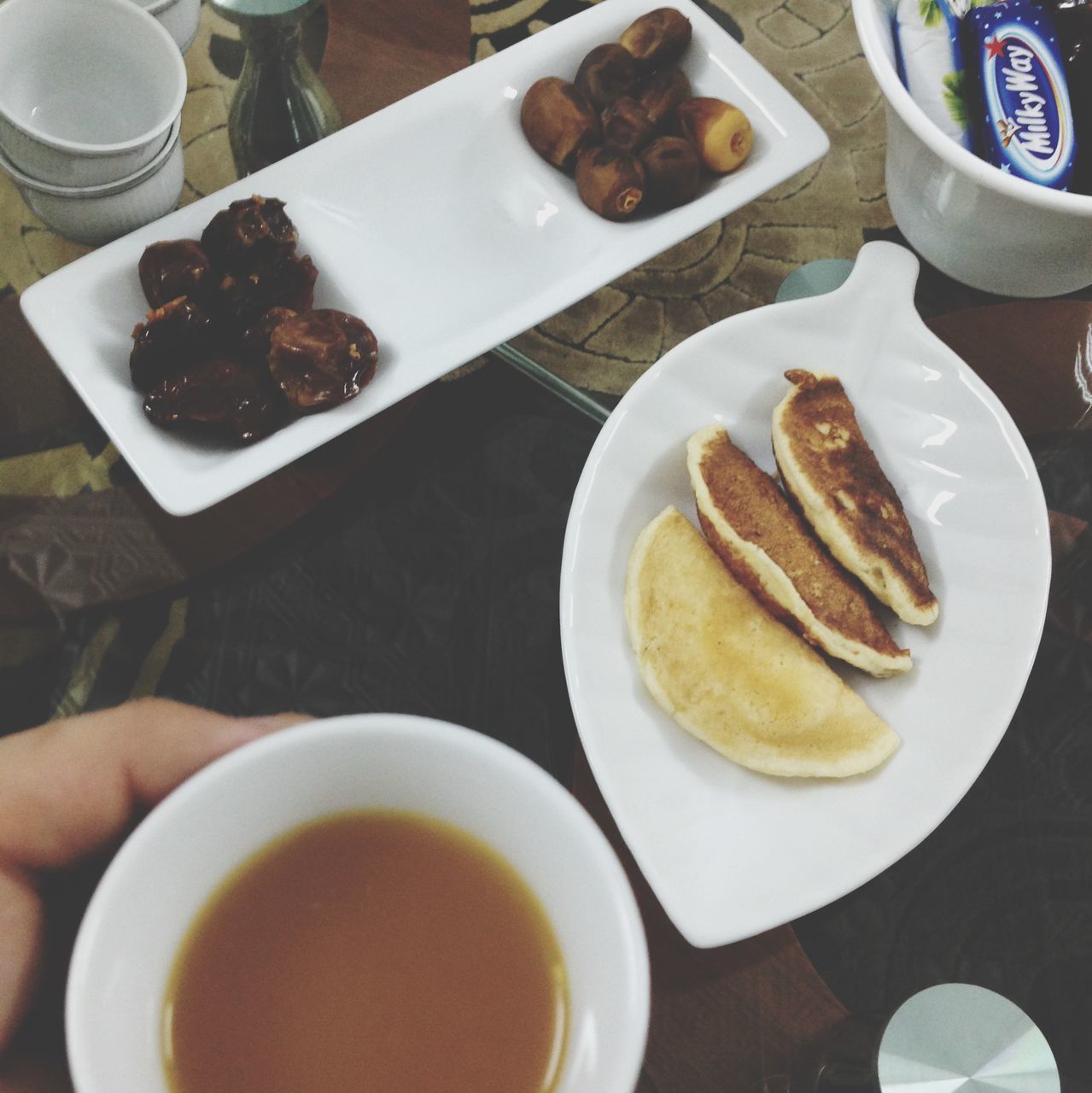 food and drink, freshness, food, indoors, drink, ready-to-eat, plate, coffee cup, table, refreshment, breakfast, coffee - drink, still life, indulgence, saucer, serving size, sweet food, high angle view, healthy eating, bread