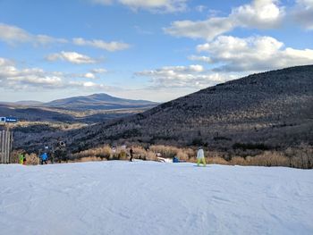 Scenic view of mountains against sky during winter