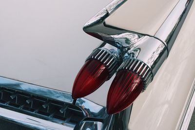 Close-up of vintage car red headlights