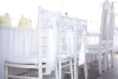 Row of chairs on table