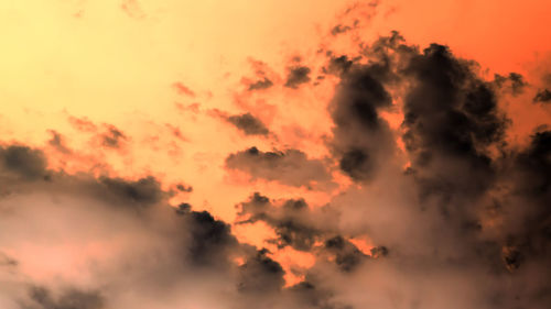 Low angle view of clouds in sky during sunset