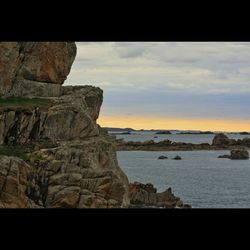 Scenic view of sea at sunset