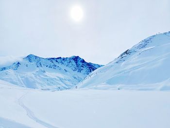 Snow covered mountain against sky