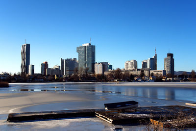 Cityscape against clear sky