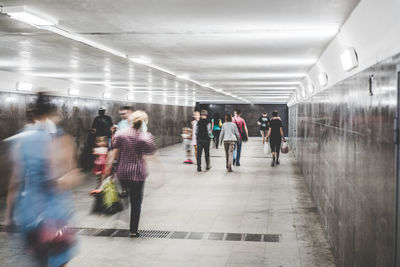People walking in subway station