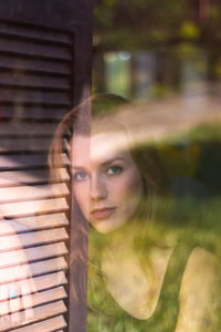 Portrait of young woman looking away