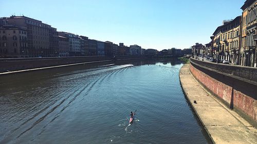 High angle view of bridge over river in city against clear sky