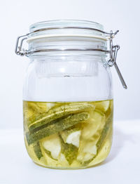 Close-up of juice in glass jar on table