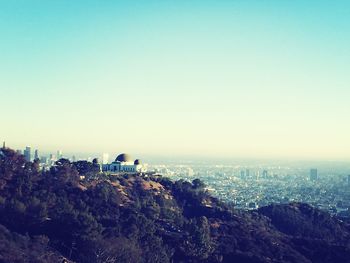 View of cityscape against clear sky