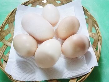 High angle view of eggs in plate on table