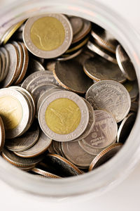 High angle view of coins