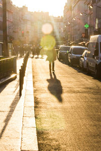 People walking on street in city