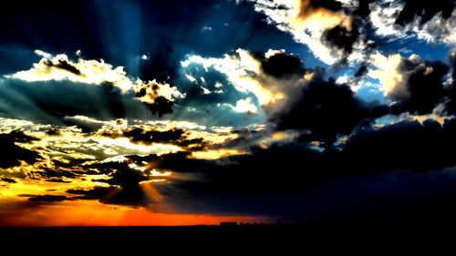 Scenic view of dramatic sky during sunset