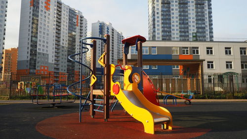 Colorful playground new district. apartment building. development city construction, mortgage family