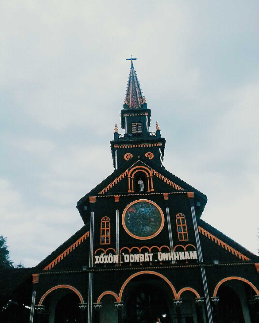 LOW ANGLE VIEW OF CLOCK TOWER