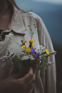 View of wildflowers in shirt pocket