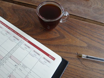 High angle view of coffee cup on table