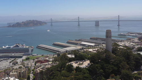 Coit tower and bay bridge taken with drone, daytime image, san francisco california