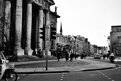 People walking on city street