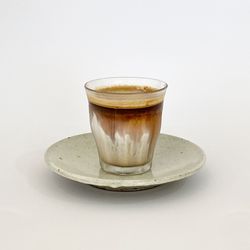 Close-up of coffee on white background