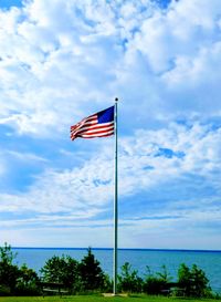 Flag against blue sky