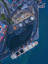 Russia, primorsky krai, vladivostok, aerial view of industrial ship moored in coal loading dock