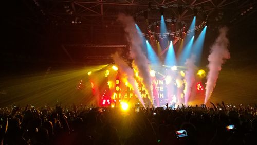 Panoramic view of crowd at music concert