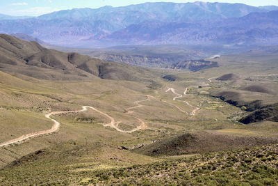 High angle view of road leading towards mountains
